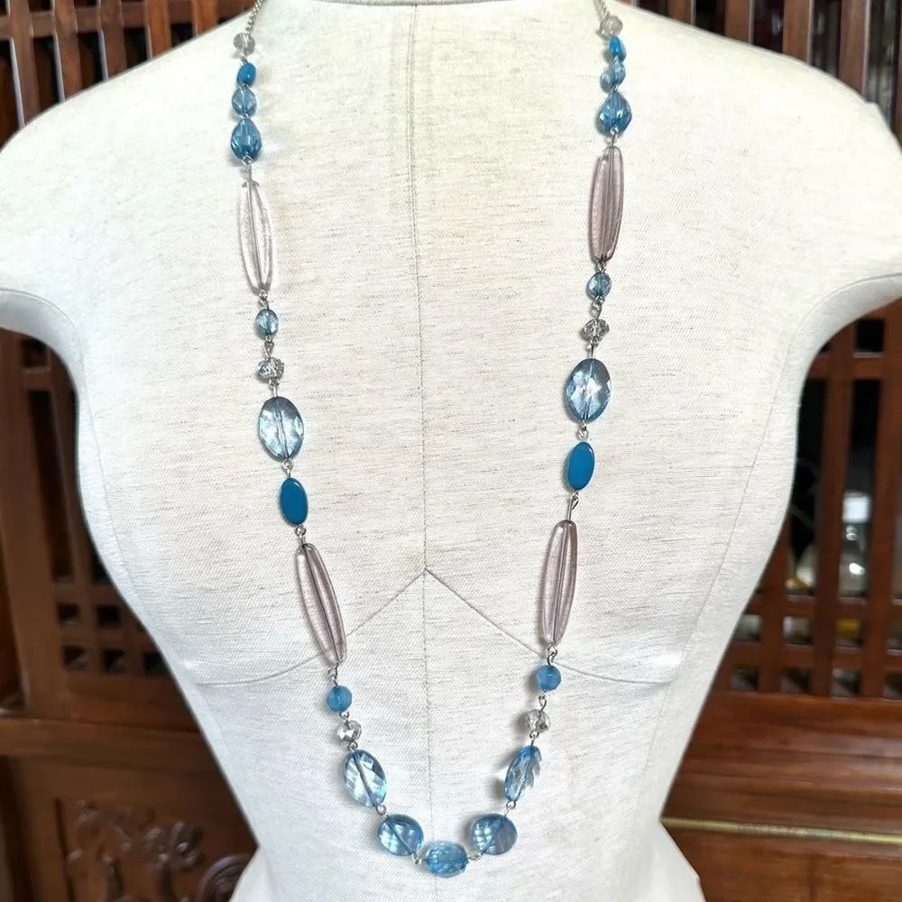 Long blue beaded silver tone necklace